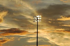 Lights on pole at Sunset sky