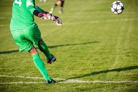 goalkeeper plays the ball