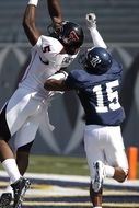 two athletes in american football
