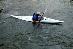 Canoeing, man in boat on river