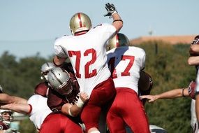 american football on a sunny day