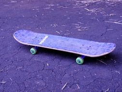 skateboard on a purple road