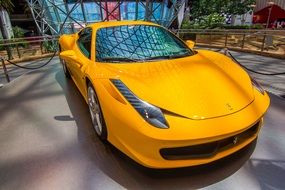 yellow ferrari in the yard