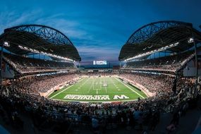 picture of Winnipeg football Stadium at night
