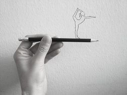 dance of a ballerina on a pencil