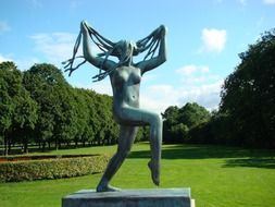 female statue with long hair in Vigeland park, norway, oslo