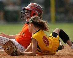 Softball Players fell