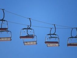 ski lifts on the blue sky