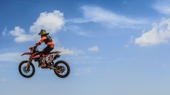 extremd motorcyclist in jumping