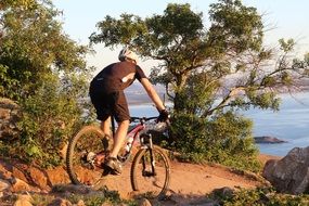 cycling in the mountains at sunset