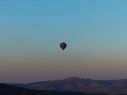 Beautiful and colorful hot air balloon on the beautiful landscape