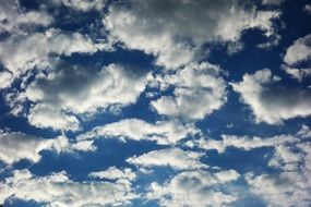 lot of fluffy white Clouds at Blue Sky