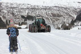 Landscape with the tractor on the mountain in winter