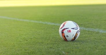 Colorful Bundesliga football ball on the stadium