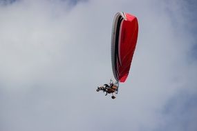 paraglider in flight in the sky