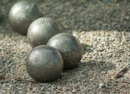 metal ball on the sand