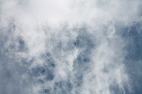 white haze of clouds in the blue sky