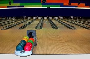 bowling balls and clubs in the club