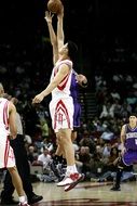 jumping strong basketball players