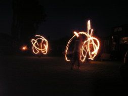 clipart of the Fire Dancing Acrobats