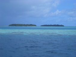 paradise islands in the blue sea