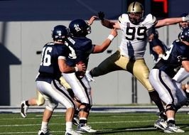 athletes in a team on american football match