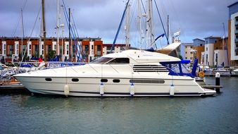 white luxury yacht in the harbor