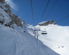 chair lift in the alps on a sunny day