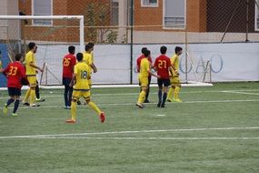 Football teams playing on a field