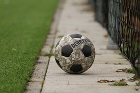Dirty football ball on the field