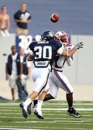 jump of a soccer players for the ball in American football