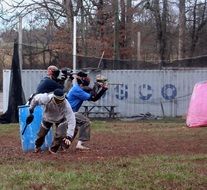 Team is playing paintball