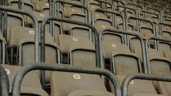 empty chairs on the stands of a stadium