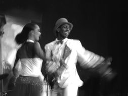 black and white photo dancing couples in the dark