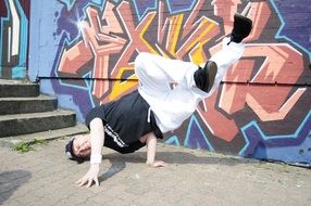 break dancer on a graffiti background