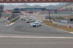 sports cars on the final lap