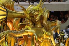 golden statues at carnival in rio