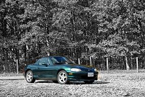 sports Mazda among nature