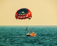 paragliding over the sea as a sport