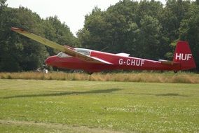 red plane like a glider