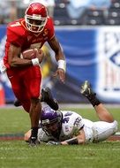 two players in action in american football