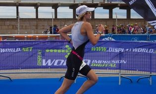 running athlete in the stadium