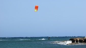 bright parachute of a kiteboarder
