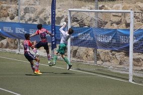 Football, Goalkeeper defending goal