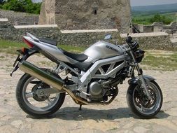 grey Suzuki motorbike