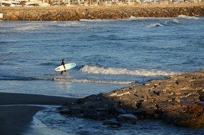 Surfing on the water with the waves