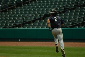 player between running bases in baseball