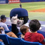 Dj Kitty, mascot for the Tampa Bay Rays Baseball team, with fans