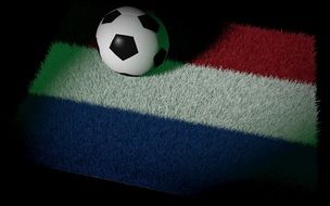 soccer ball on the flag of the netherlands