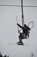 skier on ski lift